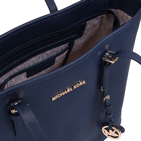 michael kors jet set travel md multifunction tote|Michael Kors jet set luggage.